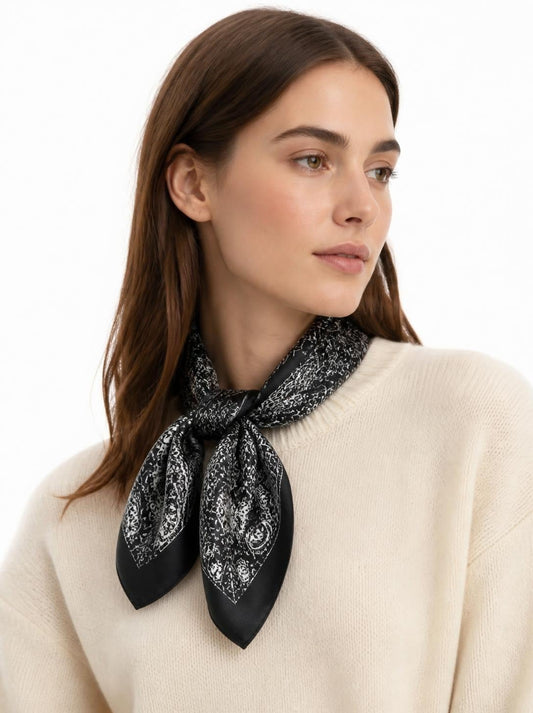 Model wearing 100% mulberry silk scarf tied at the neck