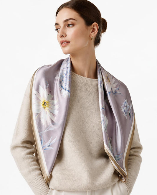 Model wearing the Poppy Field silk scarf over her shoulders